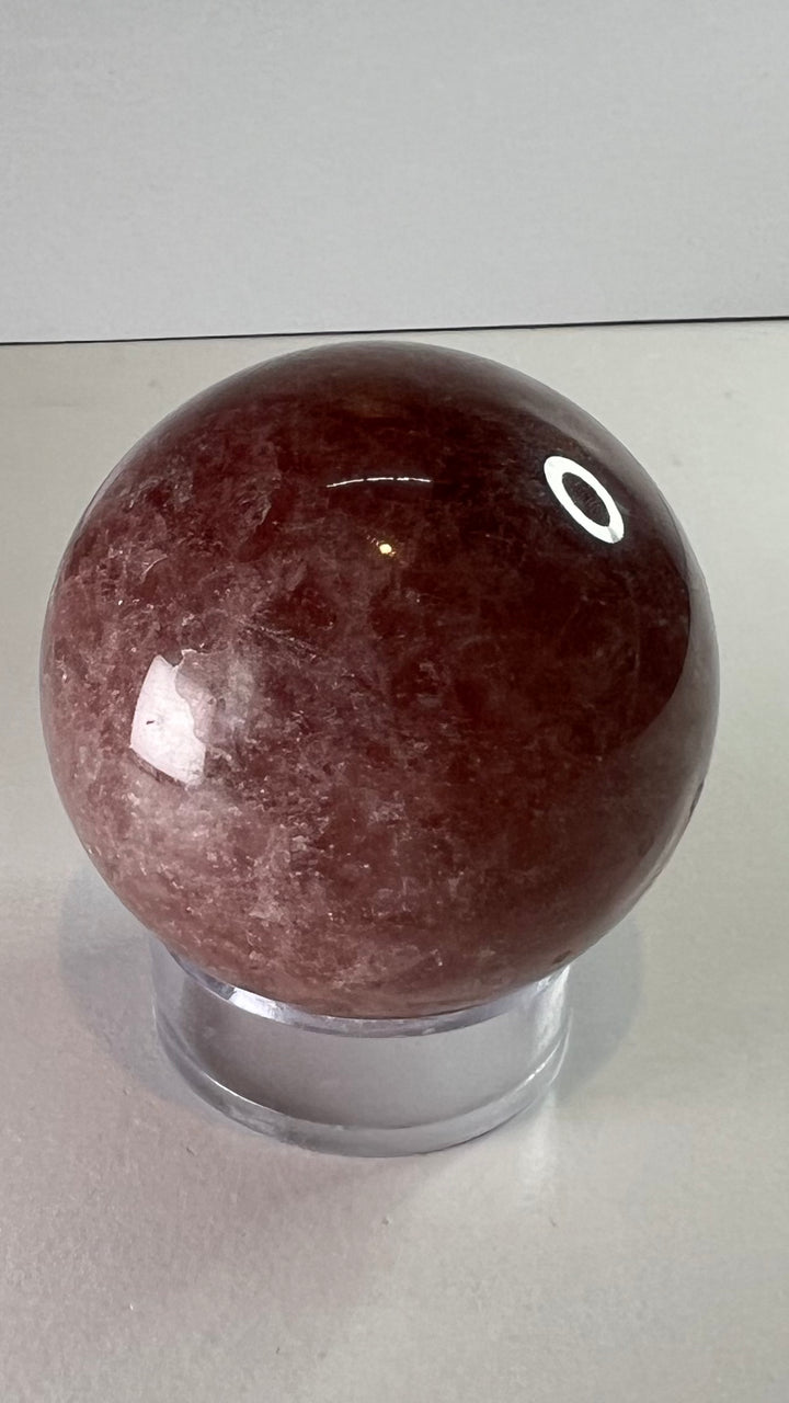 Strawberry quartz crystal sphere